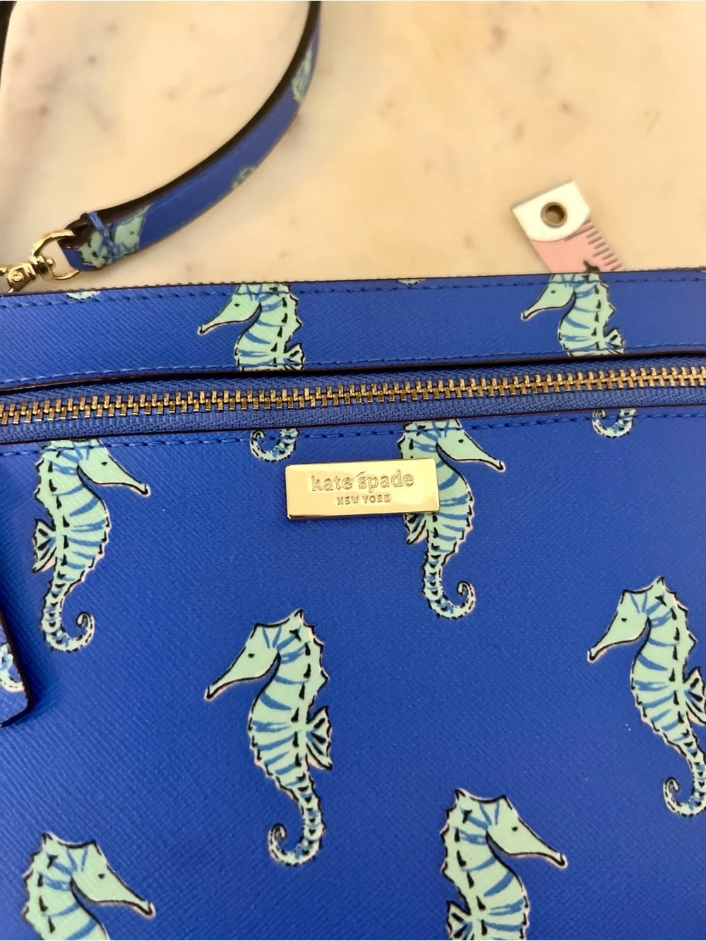 kate spade cobalt blue seahorse wristlet clutch
